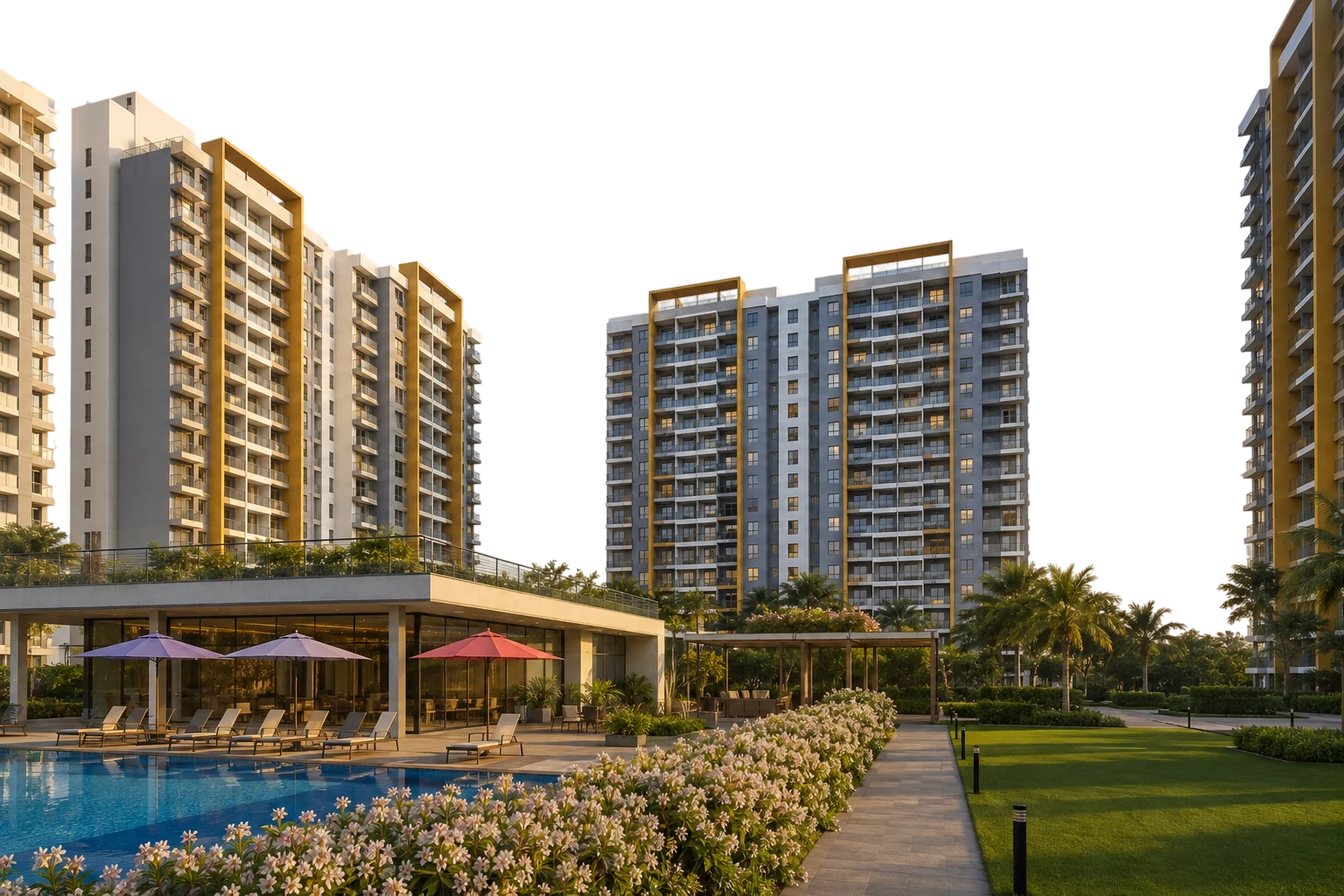Residential towers above a landscaped pool deck and clubhouse at dusk.